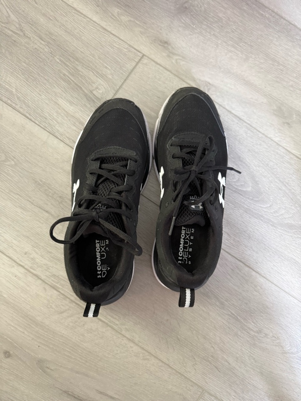 Under Armour Black and White Athletic Shoe Label